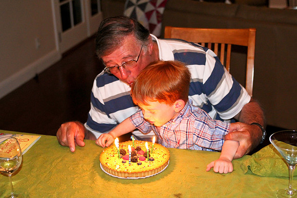 Jack helping Grandpa blow out his birthday cake-6