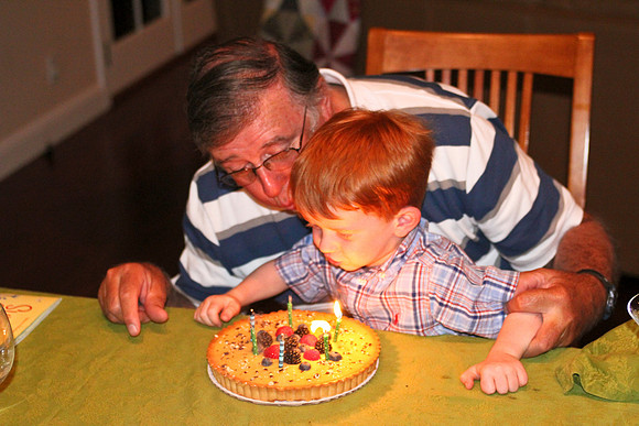 Jack helping Grandpa blow out his birthday cake-7