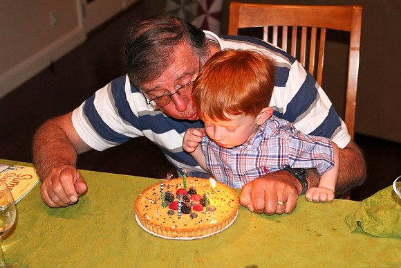 Jack helping Grandpa blow out his birthday cake-3