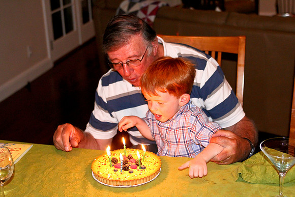 Jack helping Grandpa blow out his birthday cake-5
