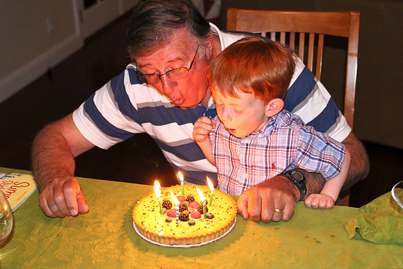 Jack helping Grandpa blow out his birthday cake-2
