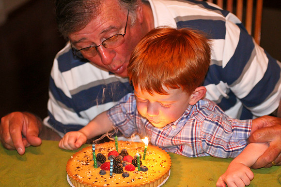 Jack helping Grandpa blow out his birthday cake-9
